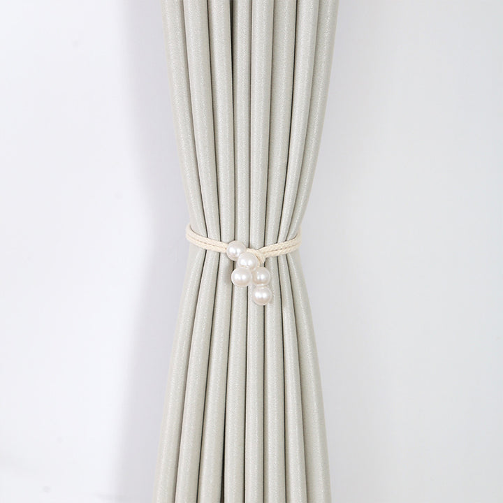 Elegant curtain tieback with pearl trim