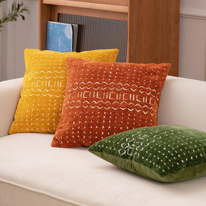 Decorative cushion cover with woven jacquard structure and ethnic motif