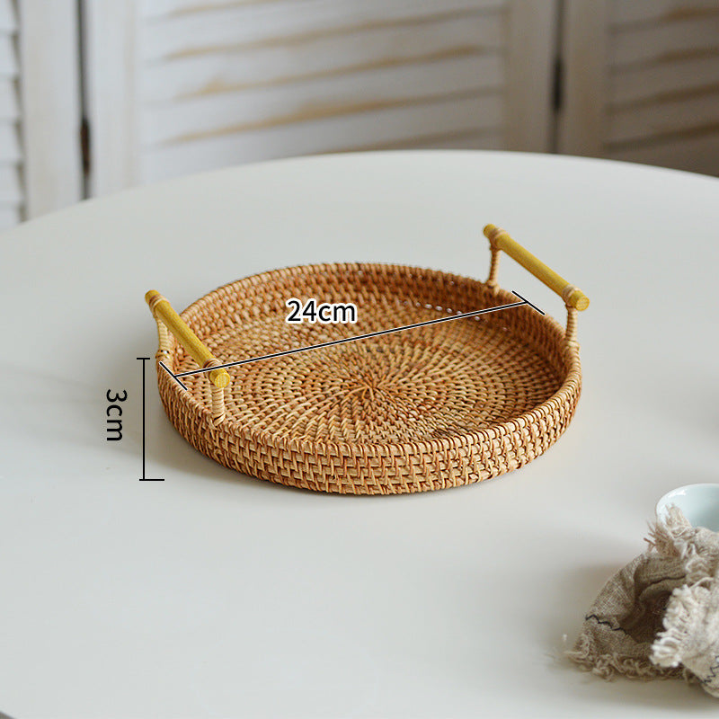 Round serving platter made of braided rattan