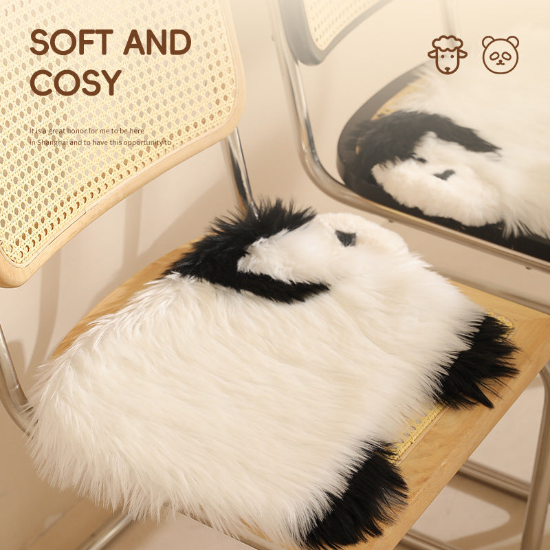 Plush seat pouf in sheep shape with cuddly faux fur cover