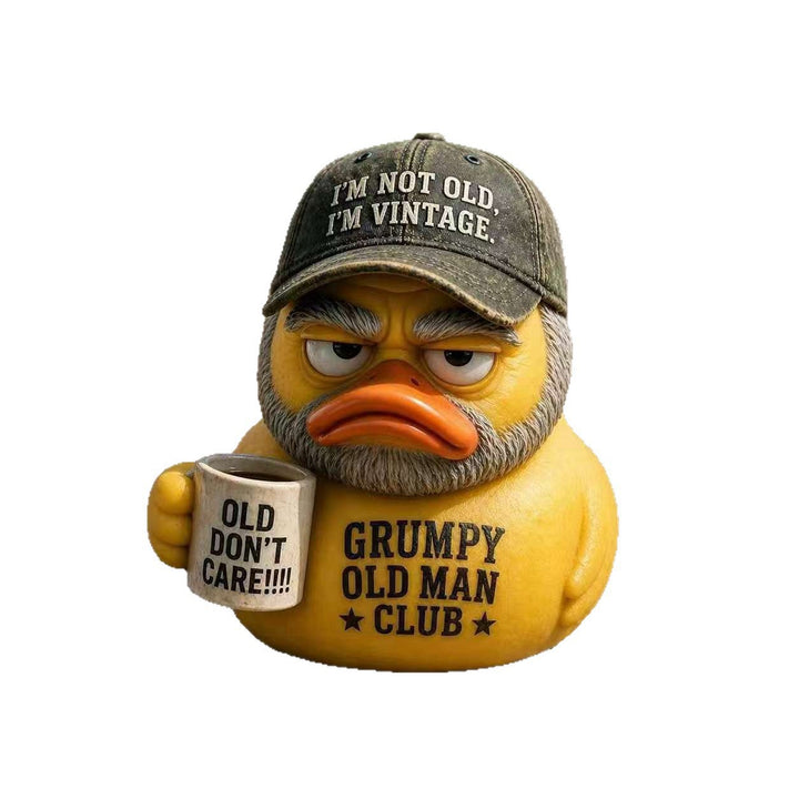 Funny rubber duck with vintage hat and cup