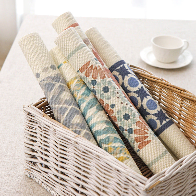 Woven placemat made of cotton blend with geometric diamond trim and fine texture