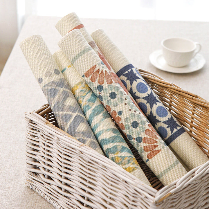 Woven placemat made of cotton blend with geometric diamond trim and fine texture