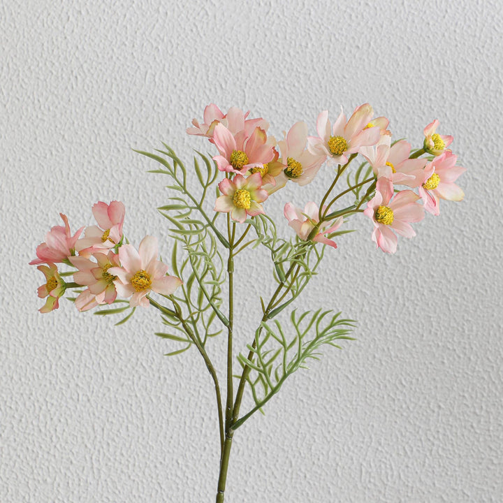 Artificial flower branch with bright pink flowers