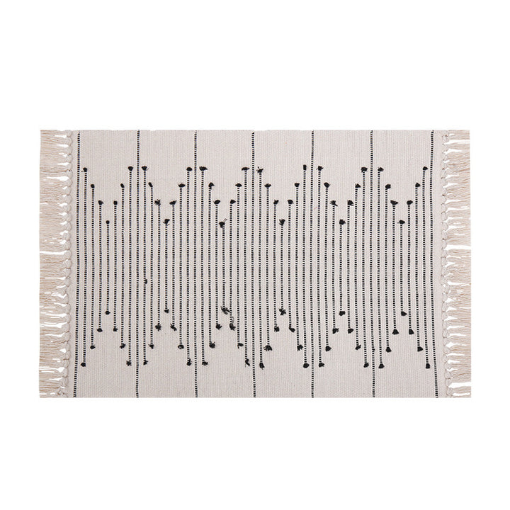 Cotton runner rug with fringes and geometric texture pattern