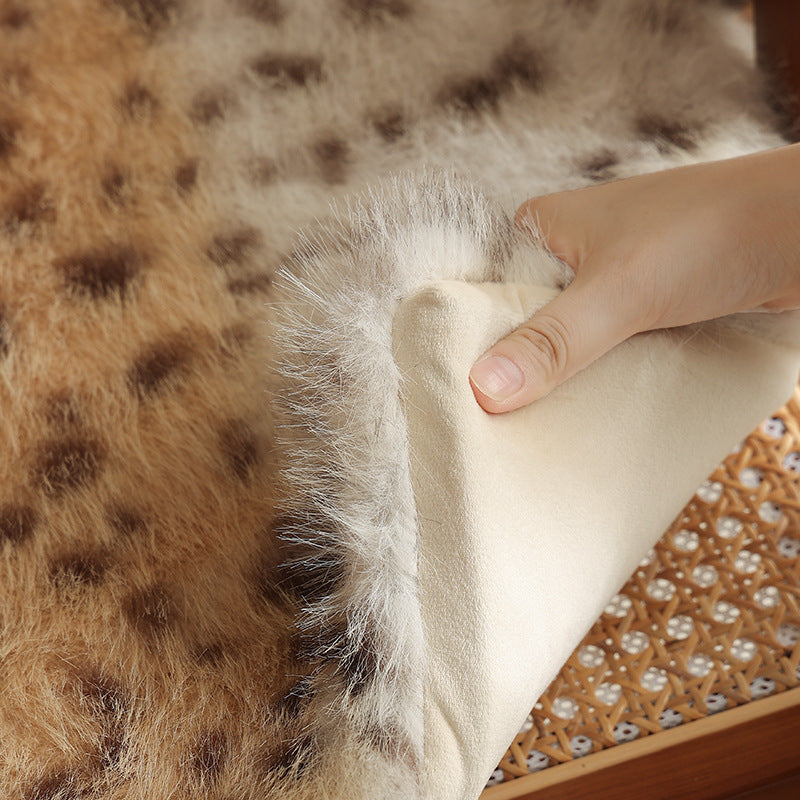 Mini shoulder bag with faux fur cover and narrow straps