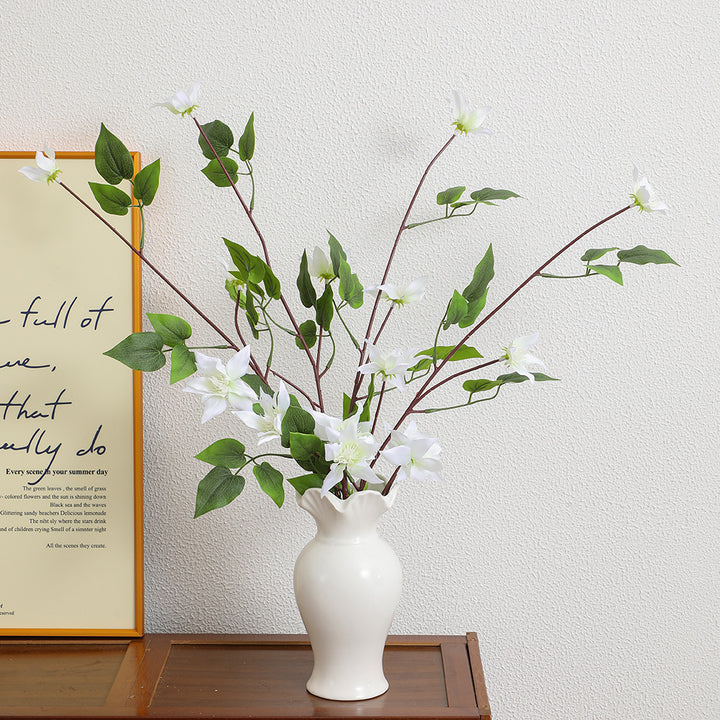 Artificial flower branch with lifelike fig tree leaves