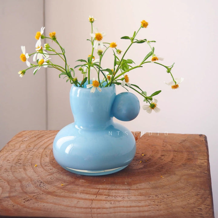 Short Bulbous Ceramic Bud Vase with Side Orb Accent