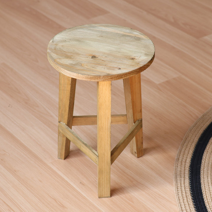 Rustic stool made of solid wood