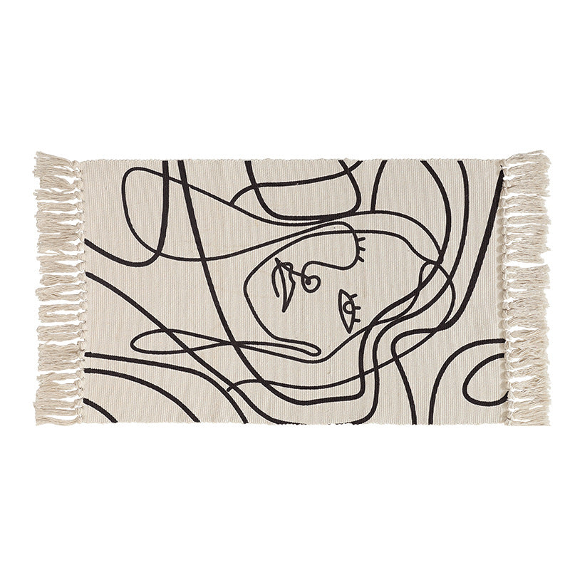 Woven cotton tabletop set with abstract line art