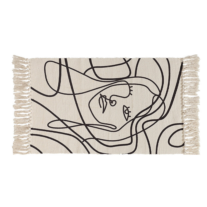 Woven cotton tabletop set with abstract line art