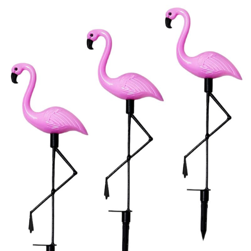 Decorative solar-powered flamingo garden stake with adjustable tray and spike attachment