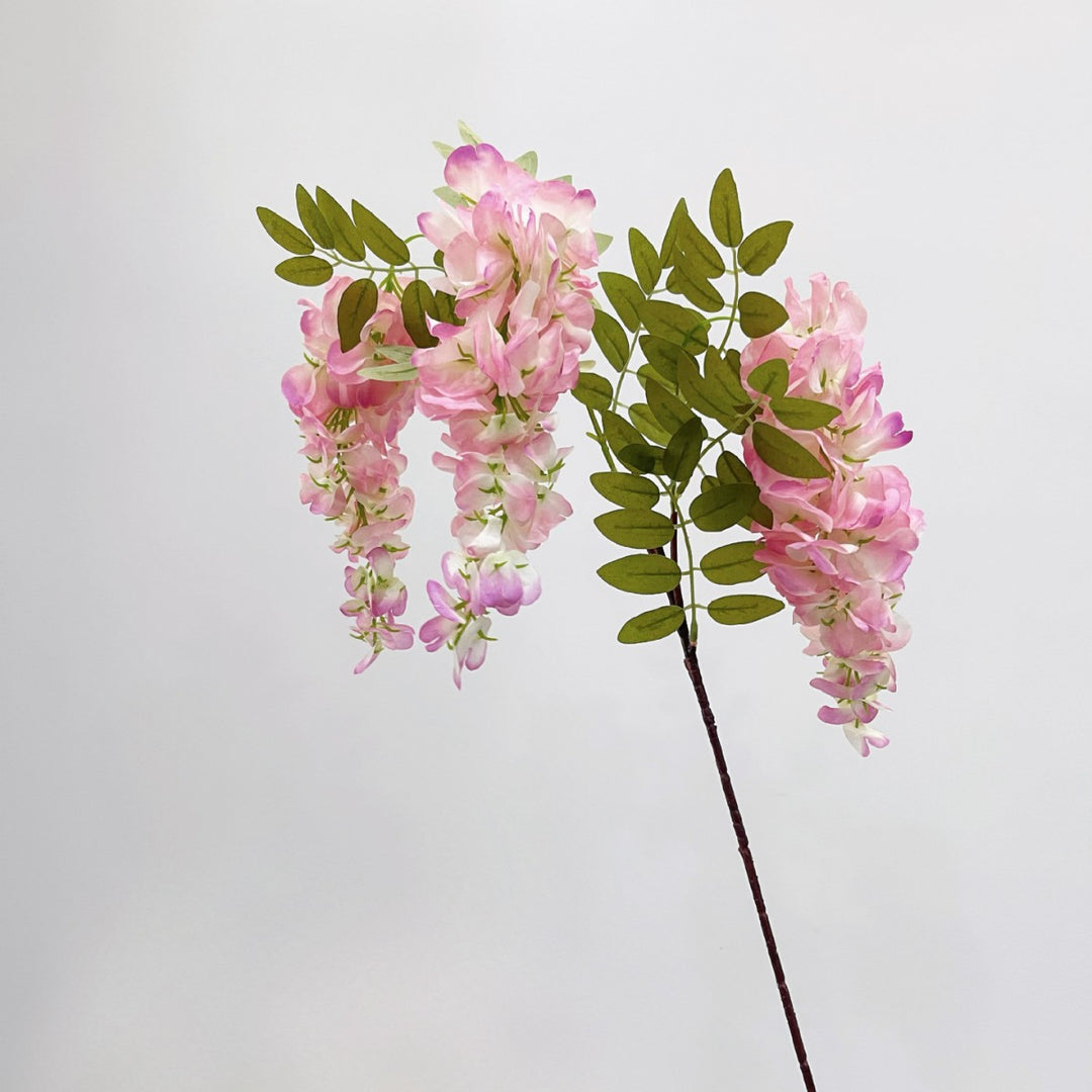 Artificial flower branch with lifelike, hanging flowers
