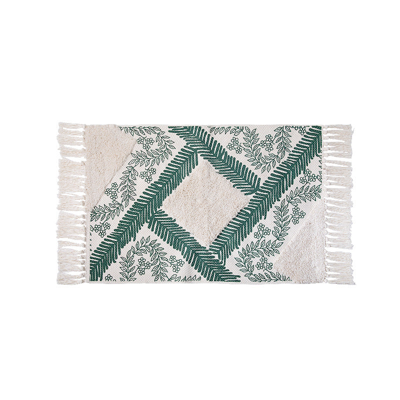 decorative woven bathroom runner with botanical jacquard pattern and fringes