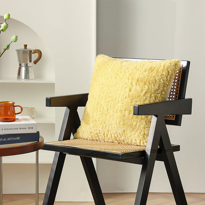 Modern decorative pillow in lambskin look with dense high pile structure