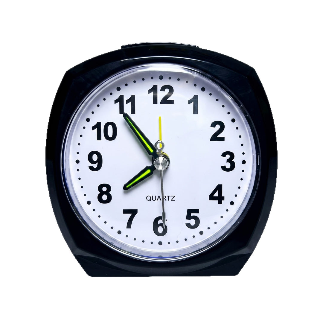 Analog alarm clock with night light and snooze function