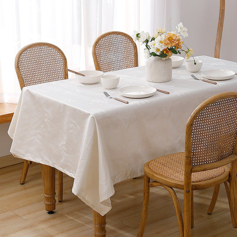 Rectangular premium table linen made of jacquard polyester with subtle frost floral embossing