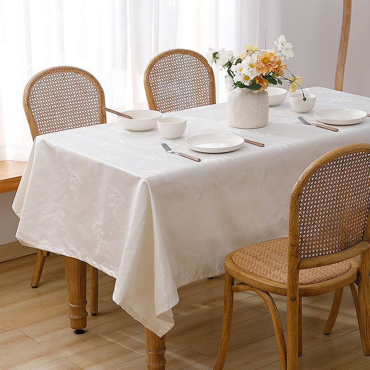 Rectangular premium table linen made of jacquard polyester with subtle frost floral embossing