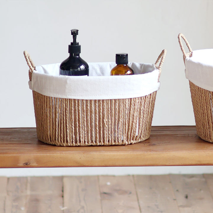 Handcrafted storage basket with white cotton lining