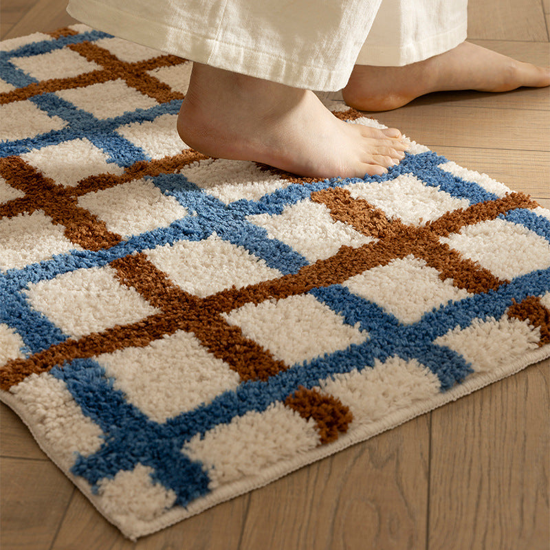 Short pile bath mat with geometric check pattern and non-slip backing