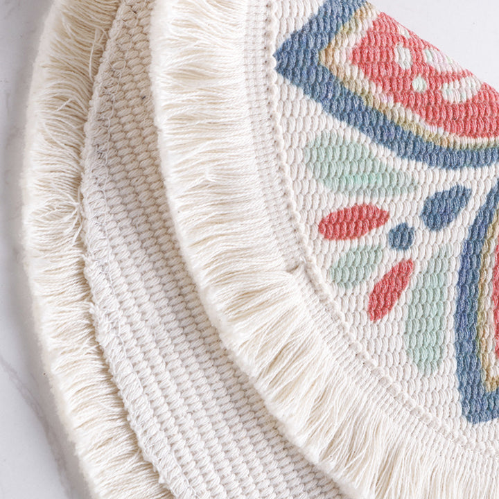 Round flat-woven cotton rug with mandala design and decorative fringes