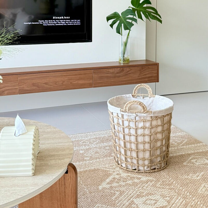 Storage basket with decorative fabric lining