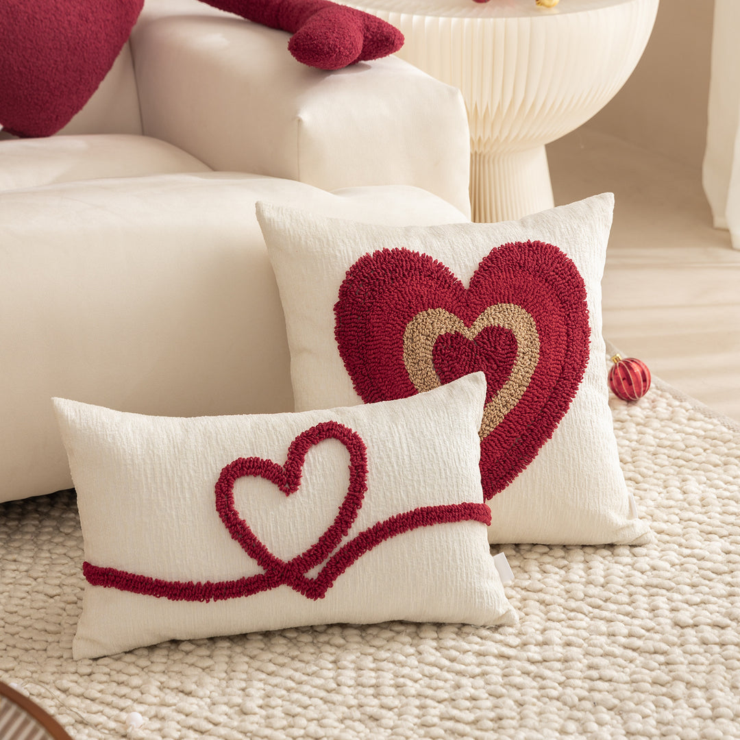 Heart-shaped cuddle cushion with extended arm applications