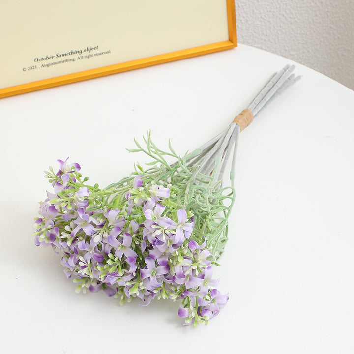 Decorative artificial flower arrangement