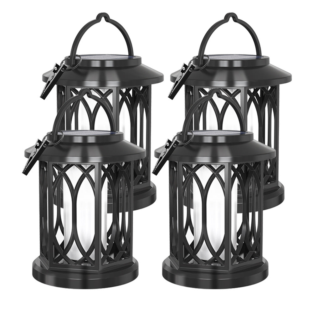 Decorative solar-powered hanging lantern for outdoor use with iron mesh frame