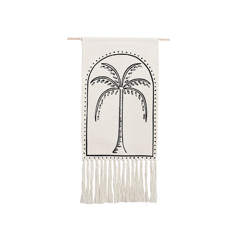 Woven wall hanging with hand-drawn mushroom motif and long cotton fringes
