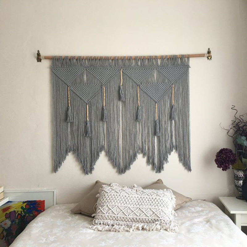 Elegant Macrame Wall Hanging with ornate fringes and leaves