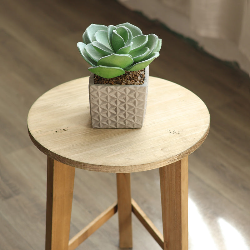 Rustic stool made of solid wood