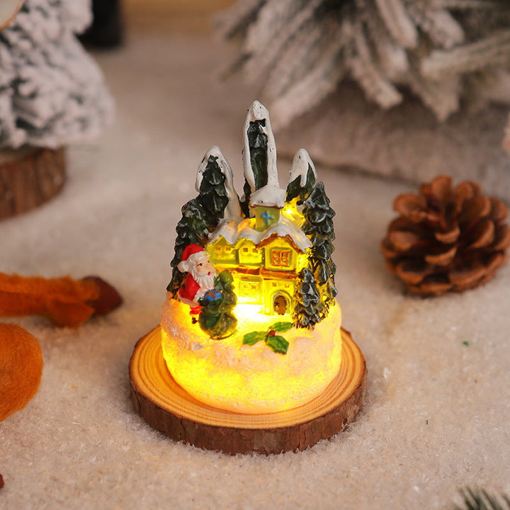 Christmas miniature lighting with snow scenes