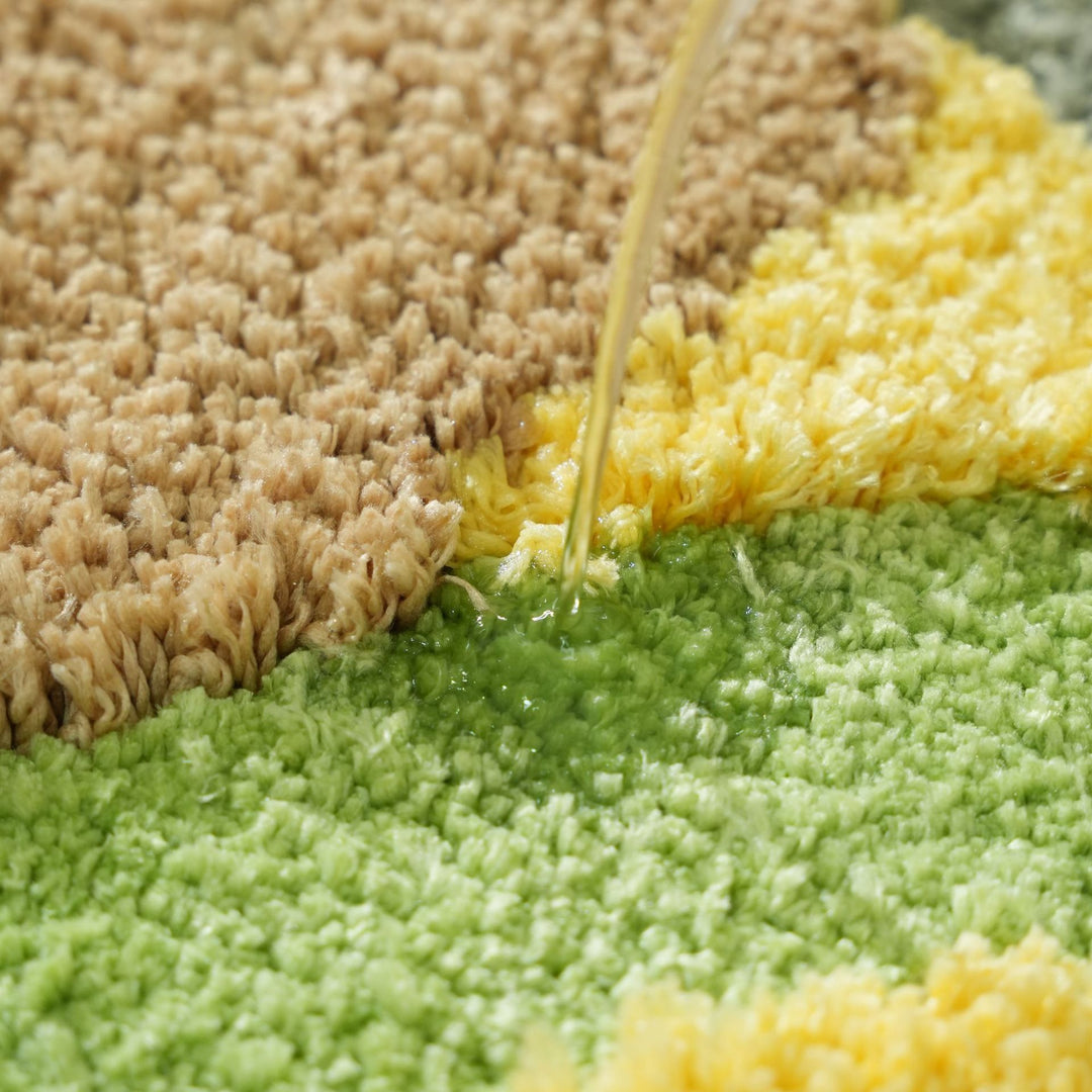 High-pile bathroom rug in organic shape with abstract textured pile