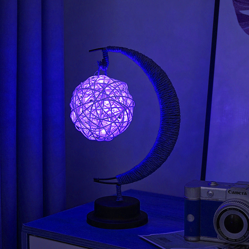 Decorative glass apple LED table lamp with moon-shaped rope-wrapped stand