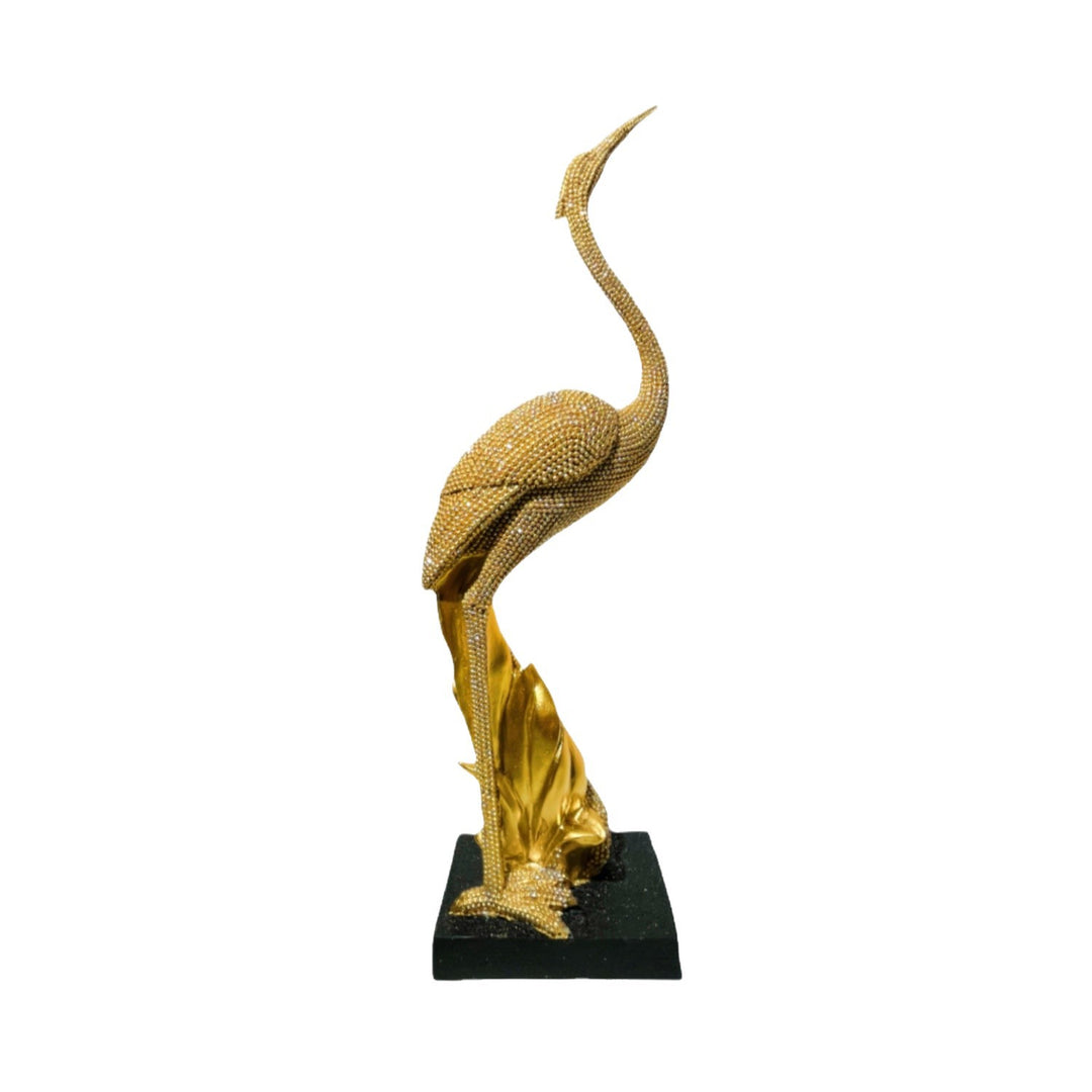 Shiny parrot figure on log