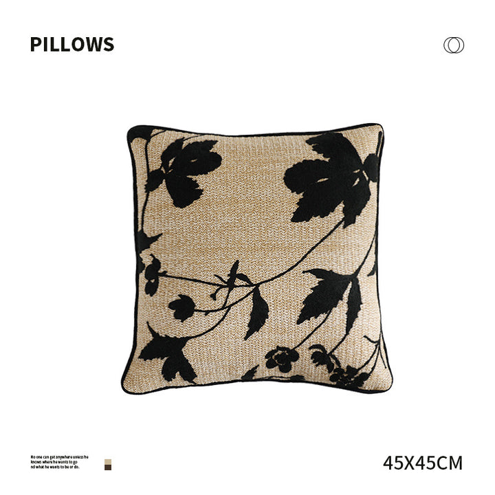Square decorative pillow with embroidered bamboo design and natural linen texture