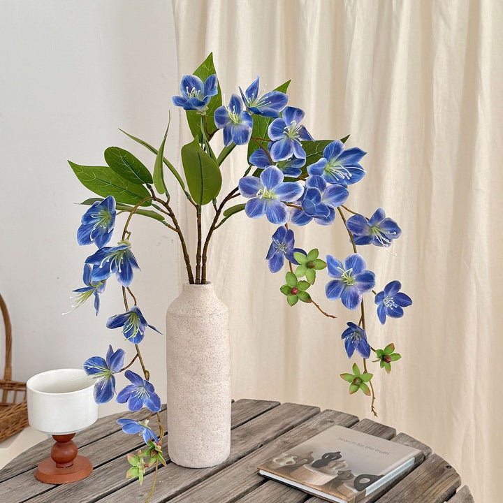 Artificial flower branch with elegant design