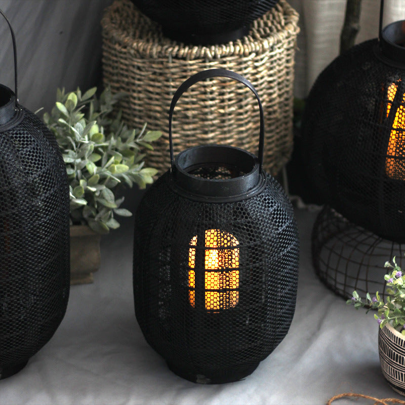 Elegant metal lantern with net design