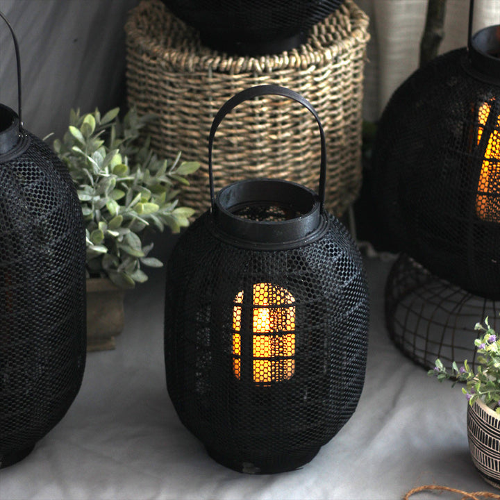 Elegant metal lantern with net design