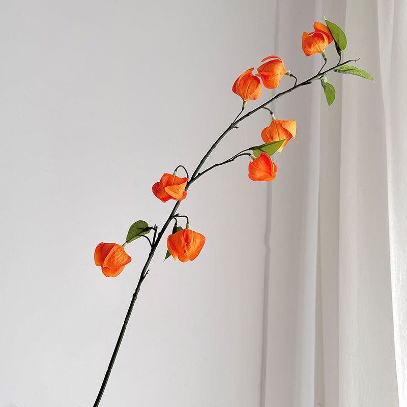Artificial flower branch with fine, vibrant flowers and natural look