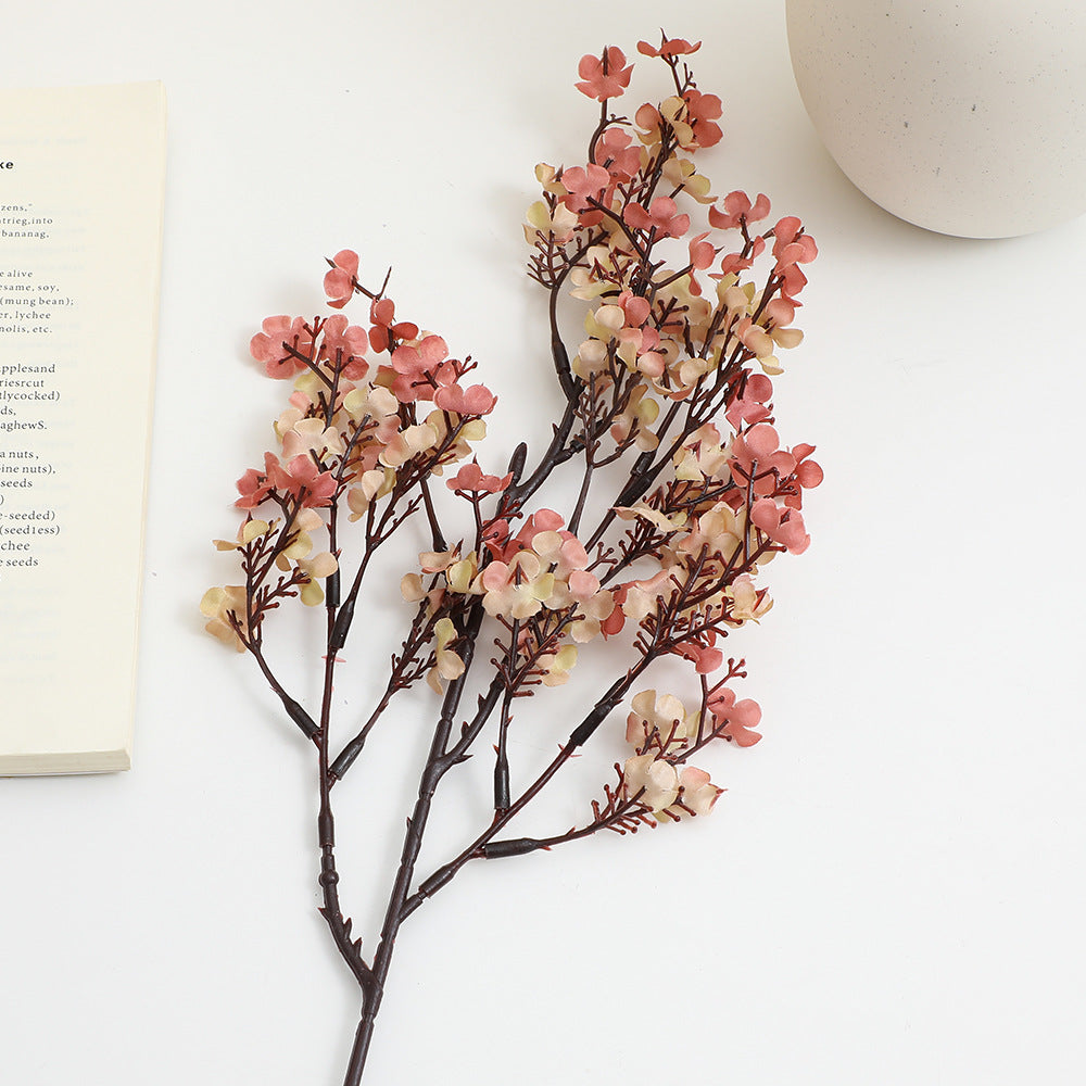 Decorative artificial flower branch