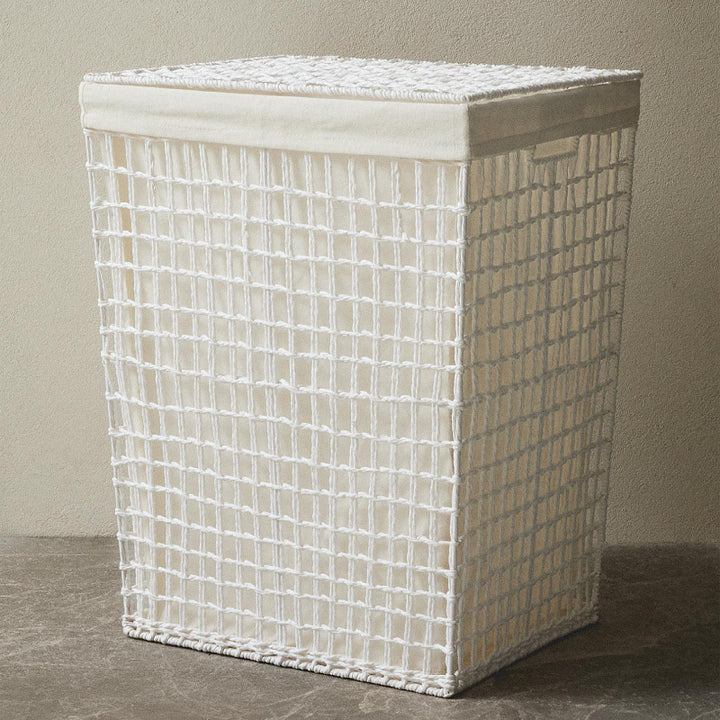 Modern laundry basket with embroidered pattern