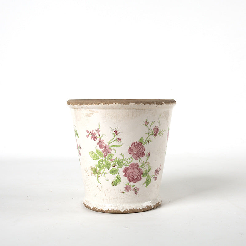 Decorative ceramic flower pot with floral design