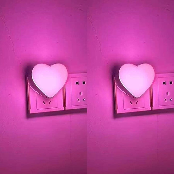 Heart-shaped plug-in ambient night light with soft LED lighting