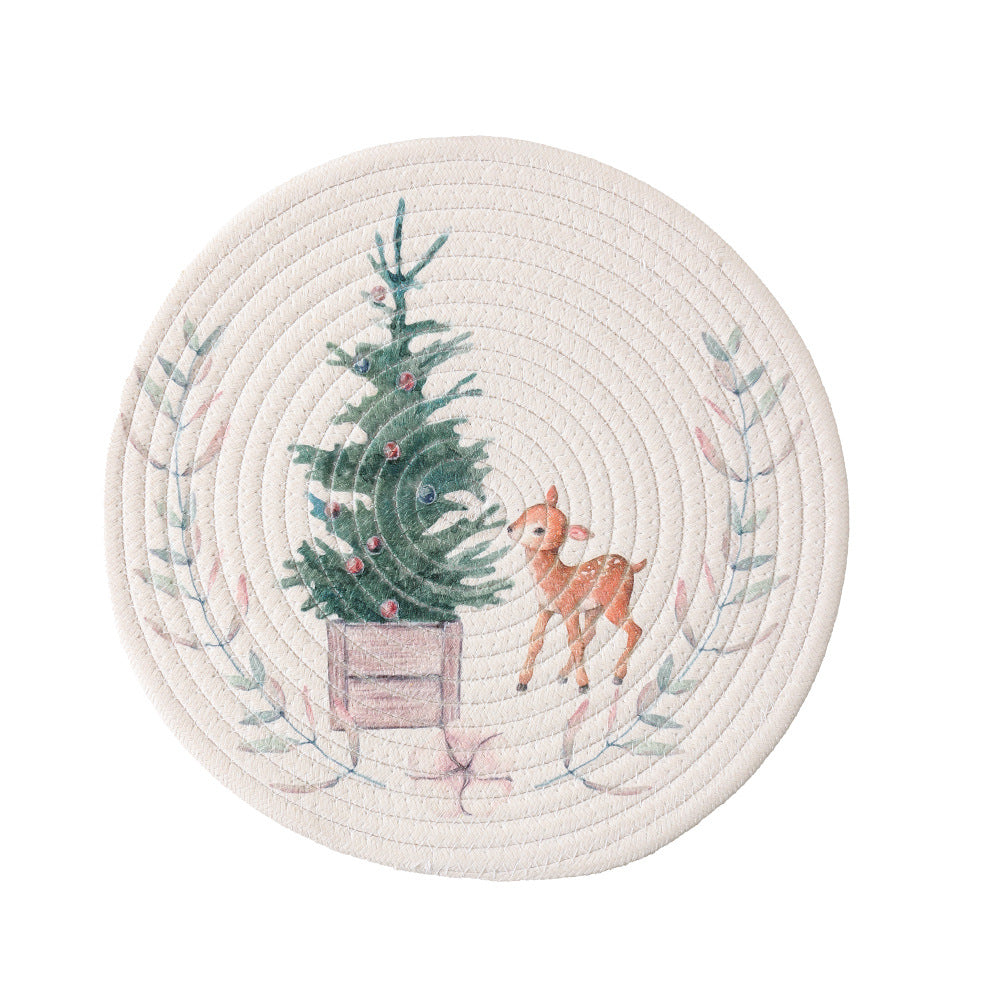 Round placemat made of woven cotton with a cute rhinoceros illustration and floral wreath