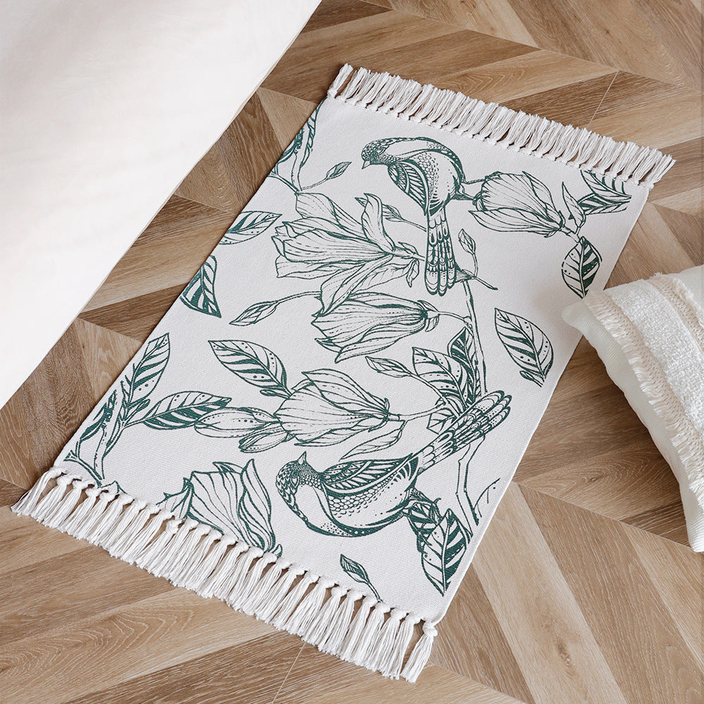 Decorative table runner made of cotton with botanical bird print and fringes