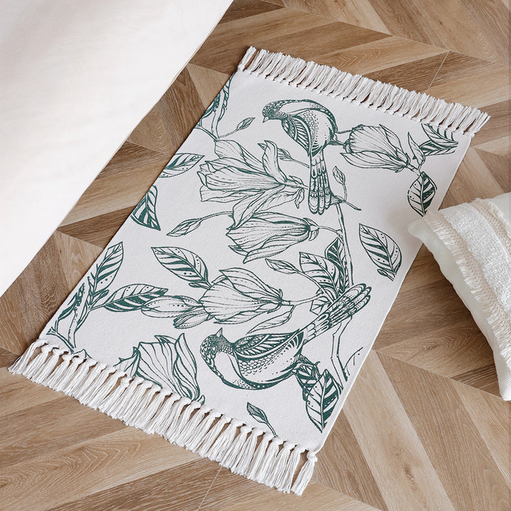 Decorative table runner made of cotton with botanical bird print and fringes