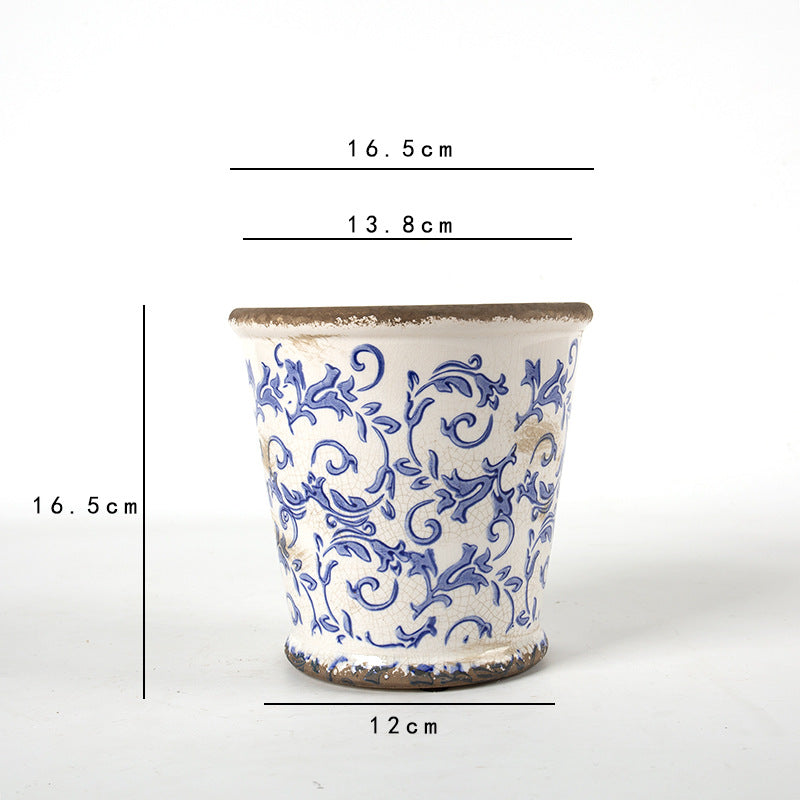 Decorative ceramic flower pot with floral design