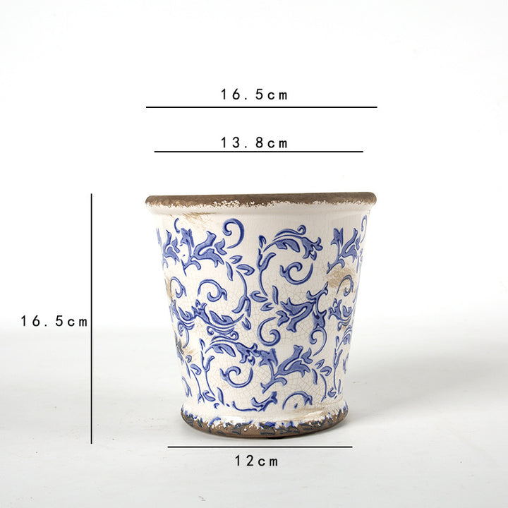 Decorative ceramic flower pot with floral design